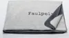 A folded blanket with text on it, displayed on a white background. Produktbild-Vorschau