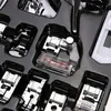A set of sewing machine presser feet in a black organizer case. Produktbild-Vorschau