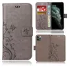 A collage of images showing a grey flip phone case with a floral pattern, including close-ups of the card slots and the phone camera area. Produktbild-Vorschau