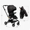 A black stroller is shown in two states: unfolded and folded, with dimensions indicated. Anteprima dell’immagine prodotto