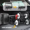 A KESSER Bollerwagen is shown being folded and stored in the trunk of a car, next to luggage. The image also includes a diagram illustrating the removable roof feature. Produktbild-Vorschau