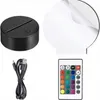 A collection of items for a 3D LED lamp, including the base, a white circular acrylic panel, a USB cable, and a remote control. Náhľad obrázku produktu