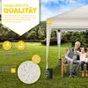 A grandfather and granddaughter sitting on a bench under a beige pop-up gazebo in a grassy garden. Anteprima dell’immagine prodotto