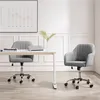 Two gray office chairs are shown in a well-lit room with a desk and a framed picture on the wall. Produktbild-Vorschau