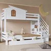 A white bunk bed with a house-like top bunk, stairs with storage, and drawers underneath, set in a child's bedroom with stuffed animals and pillows. Produktbild-Vorschau