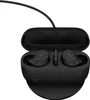 A pair of black Jabra Evolve2 Buds wireless earbuds in their charging case, connected to a charging cable. Náhled obrázku produktu