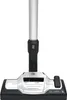 A close-up view of the bottom part of a vacuum cleaner, including the brush head and the lower section of the wand. Produktbild-Vorschau