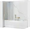 A modern bathroom bathtub with a glass shower screen and gold fixtures. Produktbild-Vorschau