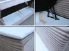 A collage of four images showing details of a boxspring bed, including the storage compartment, lifting mechanism, mattress, and upholstered side. Produktbild-Vorschau