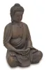 A Buddha statue sitting in meditation. Produktbild-Vorschau
