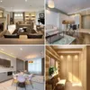 A collage of four different interior design scenes, showcasing living rooms, dining areas, and a hallway with built-in cabinets. Produktbild-Vorschau