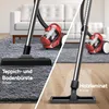 A split image showing a vacuum cleaner head on a carpet on the left and on a wooden floor on the right. The vacuum cleaner itself is visible in the background of both images. Produktbild-Vorschau