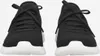 A pair of black and white Skechers sneakers are shown from the front. Produktbild-Vorschau