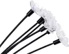 A close-up view of several flower-shaped LED lights on black stems, arranged diagonally against a white background. Produktbild-Vorschau