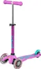 A pink three-wheeled scooter for children. Voir les images du produit