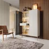 A modern living room scene featuring a display cabinet, chair, and rug. Produktbild-Vorschau