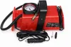 A red and black portable air compressor with a gauge and accessories, displayed on a white background. Náhled obrázku produktu