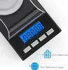 Close-up of a digital scale with a blue LCD display and buttons. Podgląd zdjęcia produktu