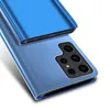 A blue flip case for a smartphone is shown from a diagonal angle, highlighting its reflective surface and camera cutout. Produktbild-Vorschau