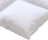 A close-up, angled view of a white pillow on a white background. Náhled obrázku produktu