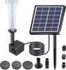 A solar-powered fountain pump with various nozzle attachments and a solar panel. Náhled obrázku produktu