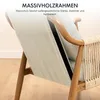 Close-up of the back of a woven chair with text overlay. Podgląd zdjęcia produktu