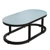 A modern oval coffee table with a light blue frosted glass top and a black metal frame. Náhľad obrázku produktu