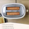 A white toaster with two slices of toast inside, placed on a wooden surface. Text describing features is present at the bottom. Produktbild-Vorschau