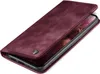 A burgundy flip case for a smartphone is shown from a diagonal angle, with the front cover partially open to reveal the phone screen. Produktbild-Vorschau