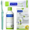 A flat lay of VITIS orthodontic dental care products including a toothbrush, toothpaste, and mouthwash, along with their packaging. Produktbild-Vorschau