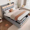A bedroom scene featuring a bed with storage, a nightstand, and a window seat. Produktbild-Vorschau