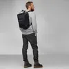 A man wearing a backpack. Anteprima dell’immagine prodotto