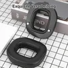 A close-up view of replacement ear pads and a frame for headphones, placed on a checkered surface. Produktbild-Vorschau