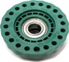 A green plastic pulley wheel with a metal bearing in the center, set against a white background. Produktbild-Vorschau