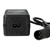 A close-up view of a black power adapter with a cable and connector. Produktbild-Vorschau