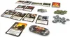 A collection of cards and tokens for a board game, laid out on a white surface. Produktbild-Vorschau