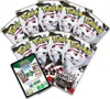 A collection of Pokémon trading card game booster packs arranged in a fanned out pattern, with a promotional card in the foreground. Anteprima dell’immagine prodotto