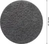 A close-up, top-down view of a circular abrasive disc, likely for a power tool, with a ruler indicating its diameter. Voir les images du produit