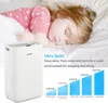 A child sleeping peacefully next to a dehumidifier. Anteprima dell’immagine prodotto