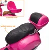 Close-up view of the rear of a pink children's electric Vespa scooter, highlighting the seat and trunk. Anteprima dell’immagine prodotto