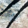 Tapis abstrait bleu et noir - Dimensions : 160 x 230 cm Voir les images du produit 4