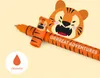 A cartoon tiger-themed pen with the text "GRRRREAT ADVENTURES" and a color swatch labeled "ORANGE". Náhľad obrázku produktu
