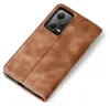 A brown leather flip case for a smartphone is shown against a white background. Produktbild-Vorschau