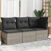 An outdoor sofa with cushions on a patio. Produktbild-Vorschau