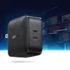 A black UGREEN wall charger with two USB-C ports is shown in a dynamic, futuristic setting with blurred images of devices charging in the background. Anteprima dell’immagine prodotto