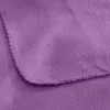 A close-up view of a folded purple fleece blanket, showing the texture and stitching of the hem. Produktbild-Vorschau