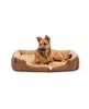 A dog lying on a dog bed.
