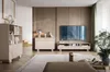 A modern living room with a TV cabinet, shelves, and a TV. Produktbild-Vorschau