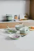 A collection of cookware items arranged on a kitchen countertop. Anteprima dell’immagine prodotto