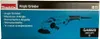 The image shows the packaging of a Makita angle grinder. The packaging is predominantly blue and features a line drawing of the angle grinder, along with the product name and model number in multiple languages. Produktbild-Vorschau